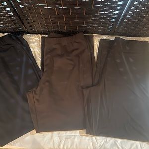 Black and brown dress pants 2(lg) and 1 pair of black (xl) dress pants
